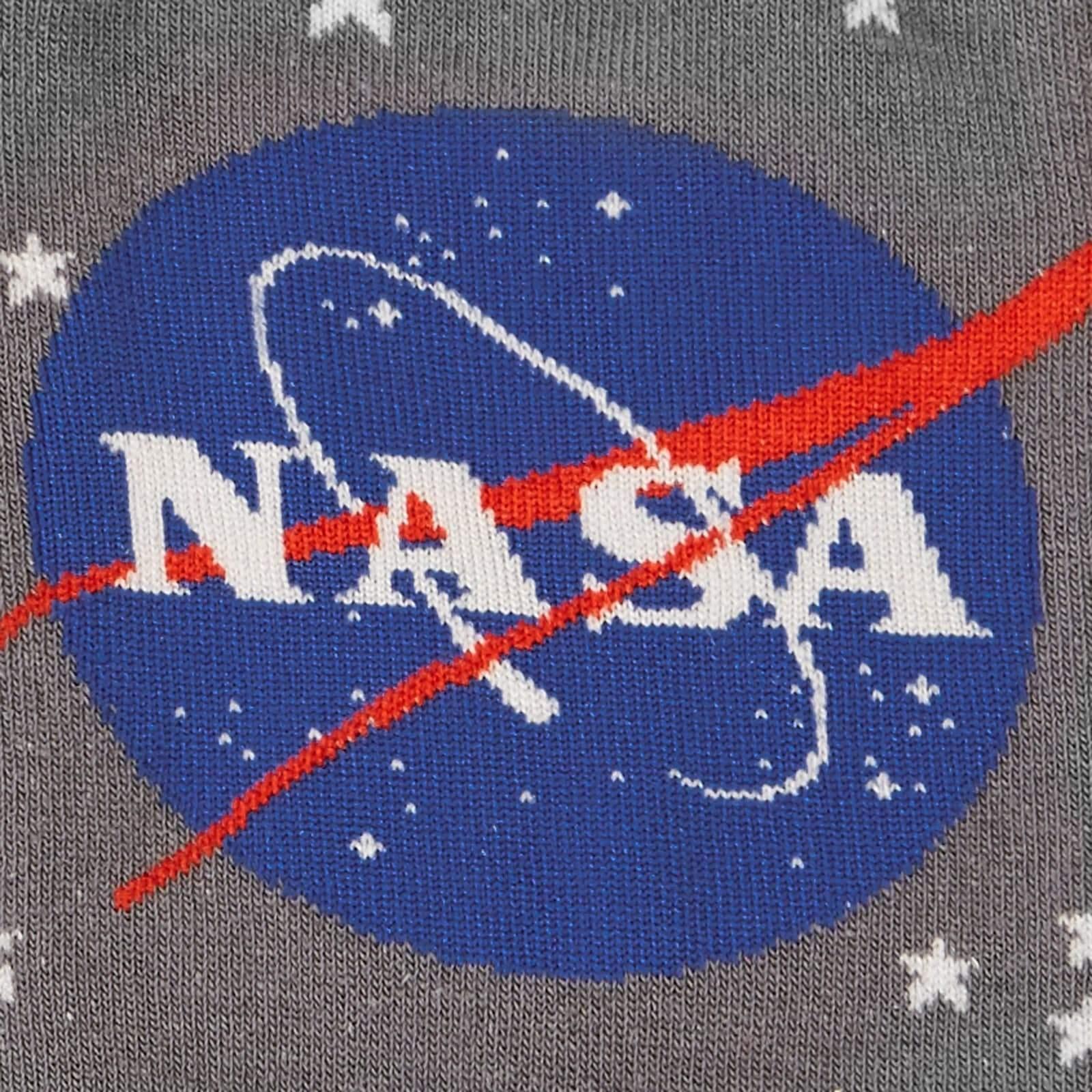 Damesokker med NASA-logo, lyser i mørket